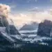 Misty Yosemite Valley with granite cliffs and waterfall, landscape photography