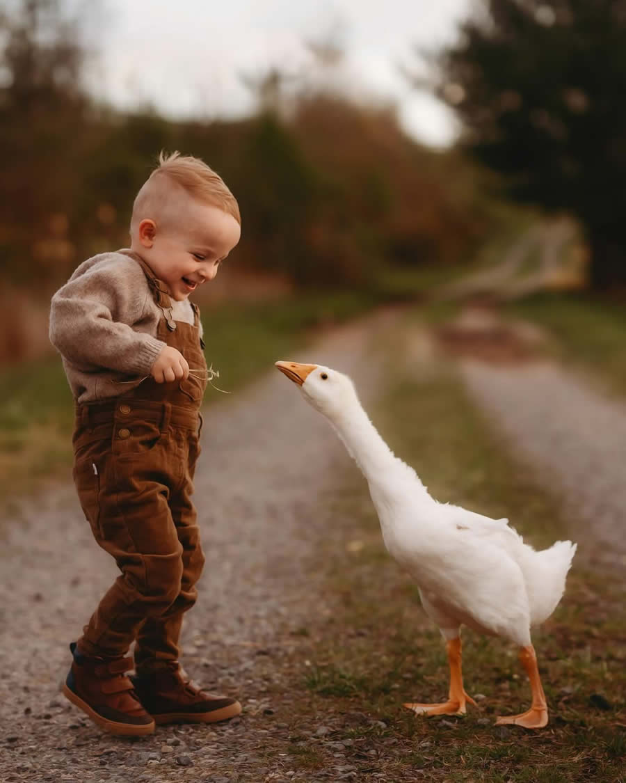 Enchanting Connection Between Children and Animals by Andrea Martin