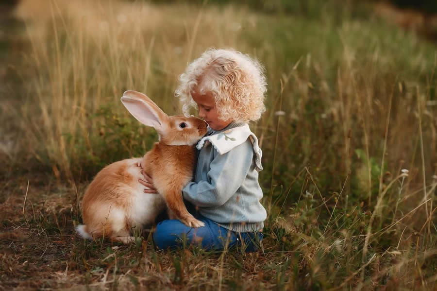 Enchanting Connection Between Children and Animals by Andrea Martin