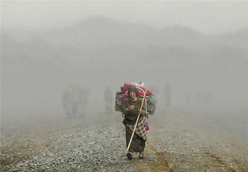 Sacred Beauty of Tibet and the Grand Buddha Festival at Langmu Temple by Hu Guoqing