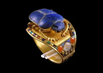 Ancient Egyptian gold scarab ring with lapis lazuli, carnelian, and turquoise inlays