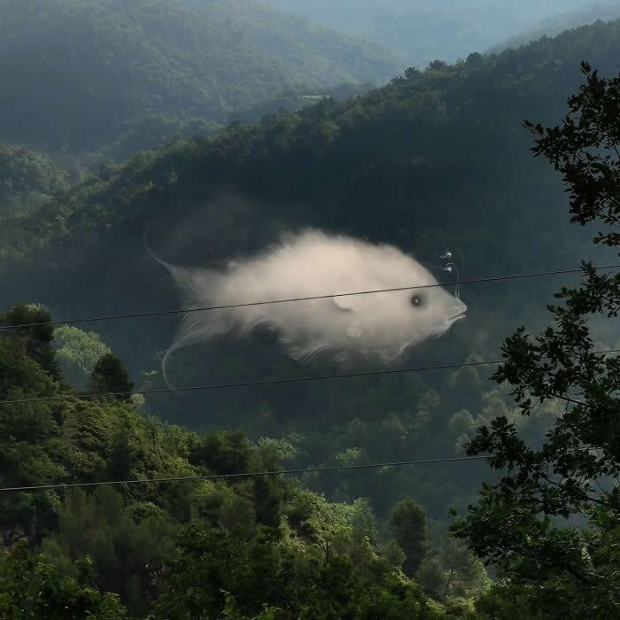 Serene Landscapes with Hauntingly Beautiful Cloud Illustrations by Vorja Sanchez