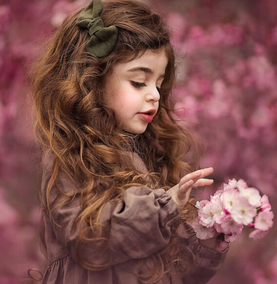 Photographer Roberta Baneviciene Captures Stunning Portraits of Girls Holding Flowers Gracefully