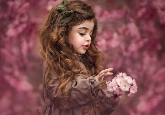 Photographer Roberta Baneviciene Captures Stunning Portraits of Girls Holding Flowers Gracefully