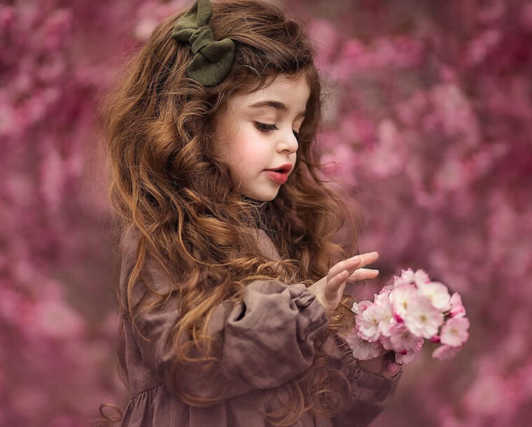 Photographer Roberta Baneviciene Captures Stunning Portraits of Girls Holding Flowers Gracefully