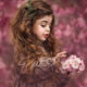 Stunning Portraits of Girls Holding Flowers Gracefully by Roberta Baneviciene