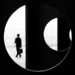 25 Inspiring Street Winning Photos From The 2025 Minimalist Photography Awards 41 Suited figure framed through circular architectural opening