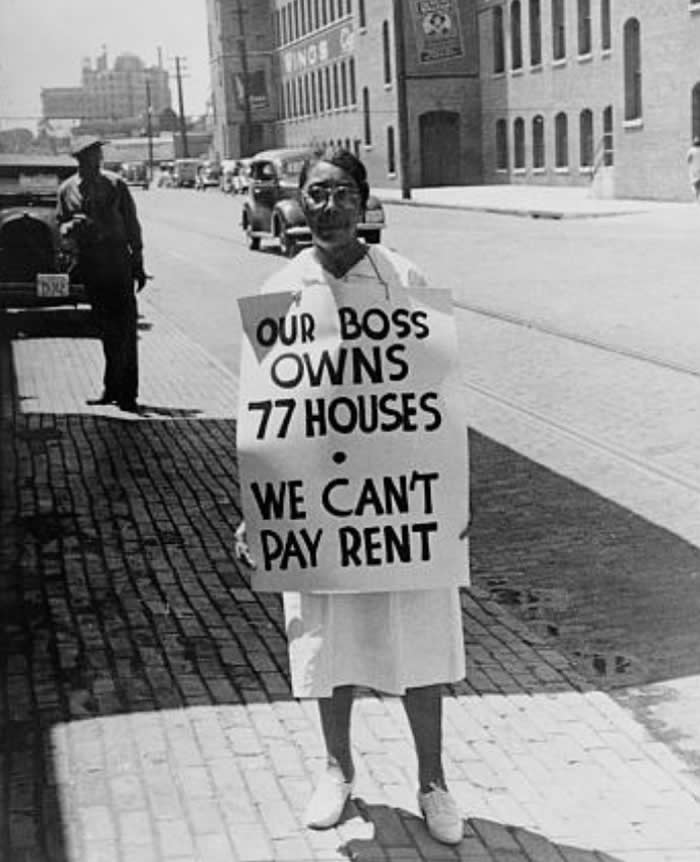 A woman protesting wealth inequality in North Carolina, circa 1930s