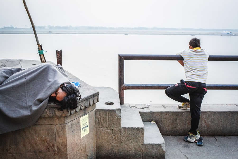 Man Sleeping in Ghats of Varanasi India - Captivating Street Photography by Giancarlo Zuccarone