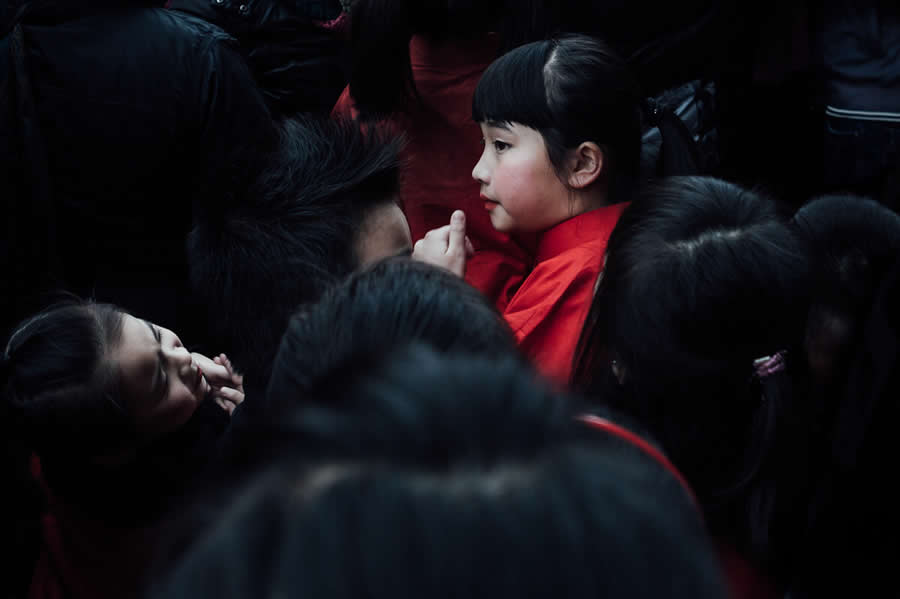 Girl with Red Color - Captivating Street Photography by Giancarlo Zuccarone