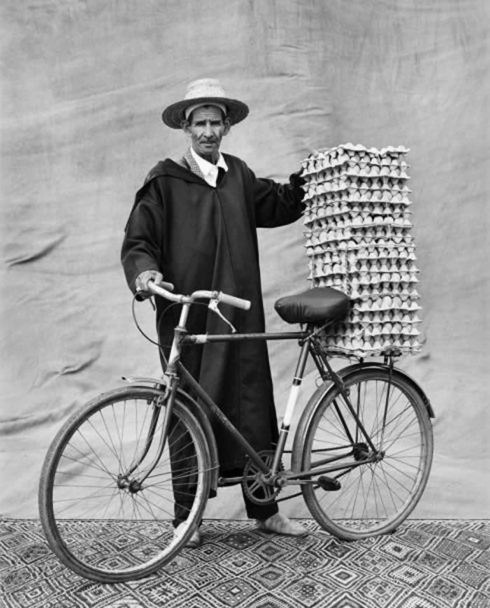 Man selling eggs from his bicycle - Black and White Bicycle Photos of Everyday Life