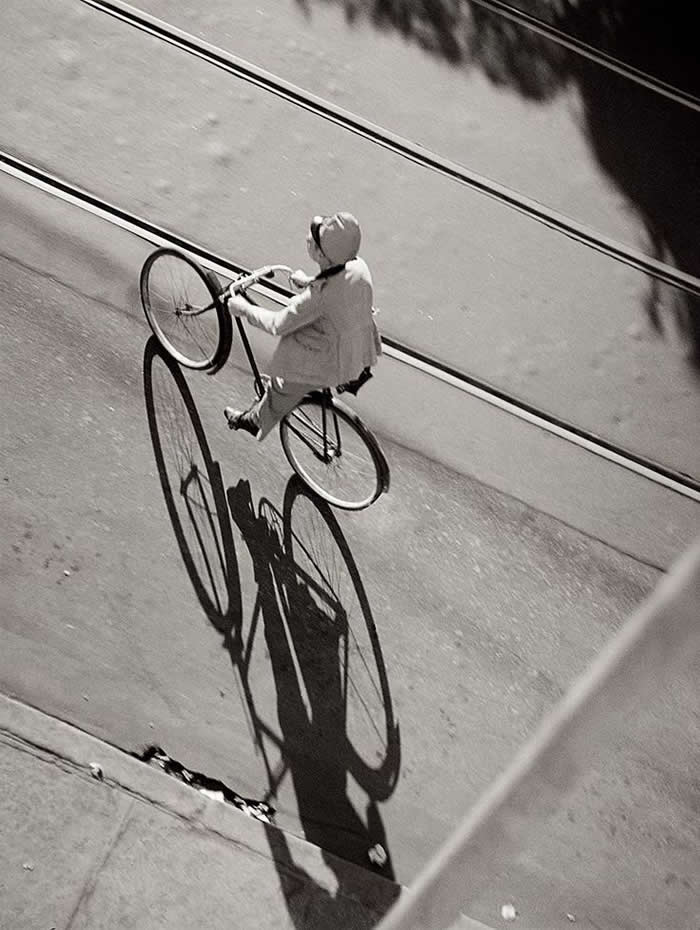 Bicycle casting a long shadow on the ground - Black and White Bicycle Photos of Everyday Life