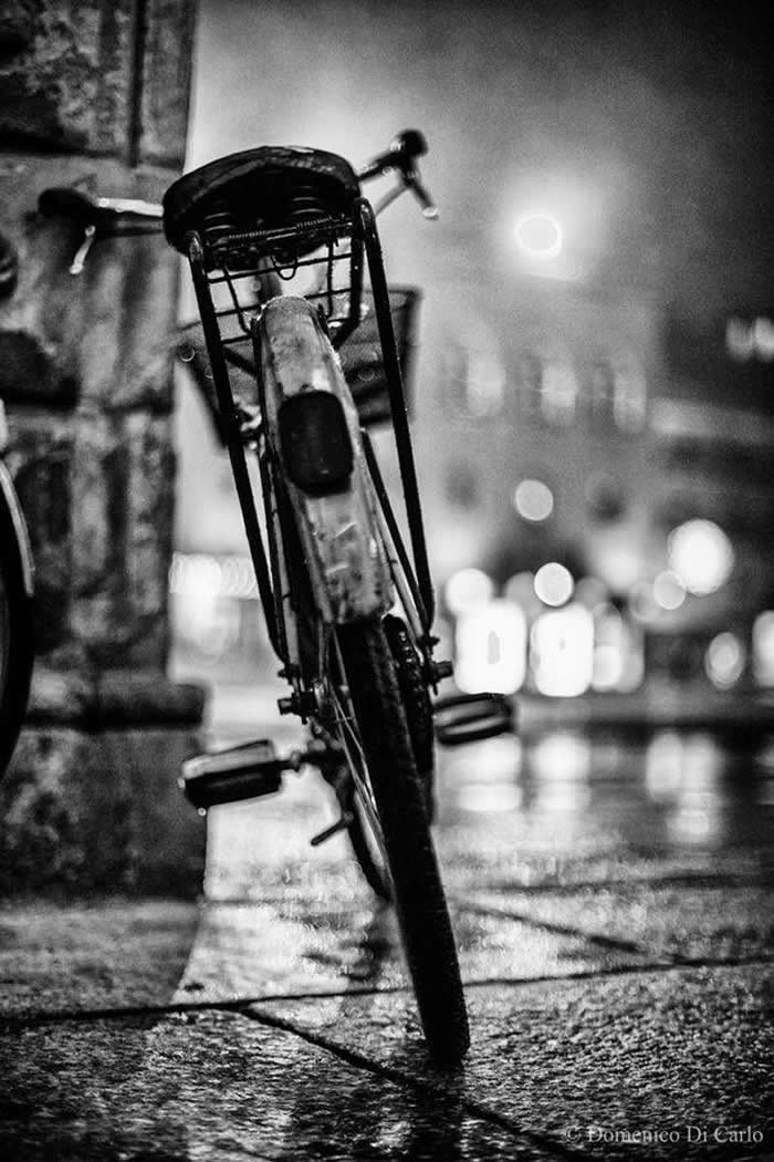 Vintage bicycle leaning against a wall - Black and White Bicycle Photos of Everyday Life