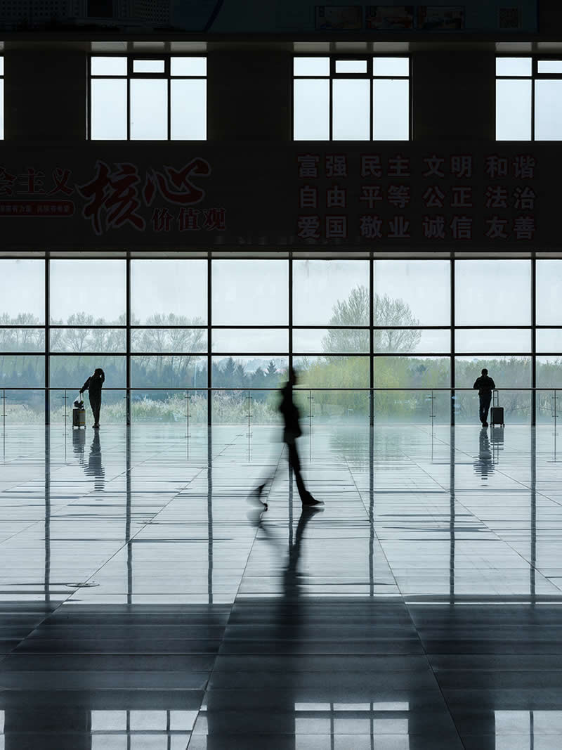 Three Travelers (Wait, Move, Wait) by Zili Zhang, United States - Street and Travel Photographs from the Chromatic Photography Awards