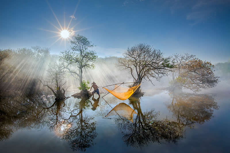 Lift net by Ngoc Luan Nguyen, Viet Nam - Street and Travel Photographs from the Chromatic Photography Awards