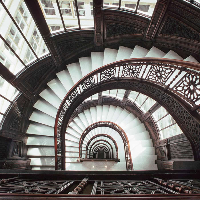 Looking down the spiral staircase of the Sullivan Center in Chicago. - Hidden Beauty of Our World