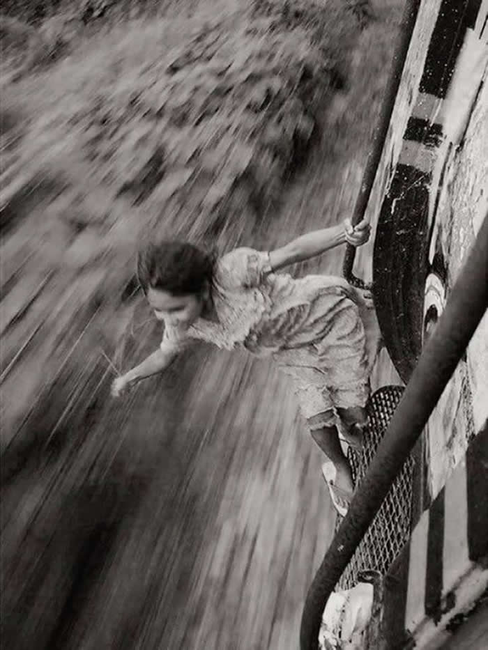 Girl enjoying a train ride - Pure Joy of Childhood Black and White Photos
