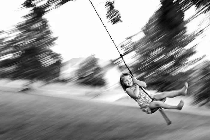 Girl skipping rope with high energy - Pure Joy of Childhood Black and White Photos