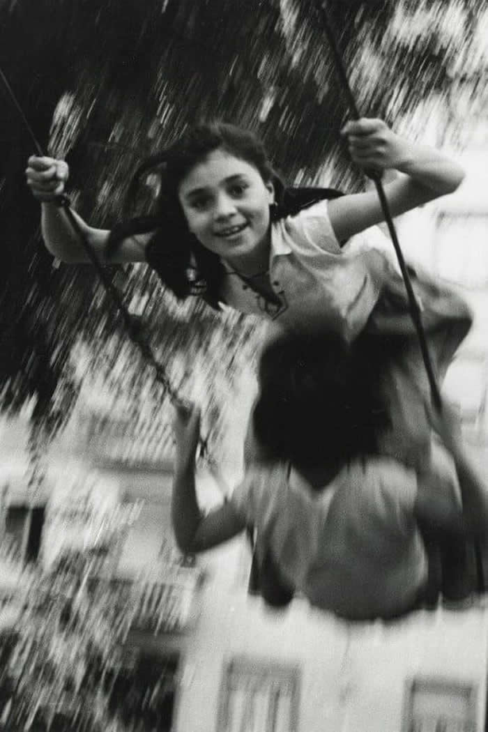 Two girls playing — a perfectly composed photograph - Pure Joy of Childhood Black and White Photos