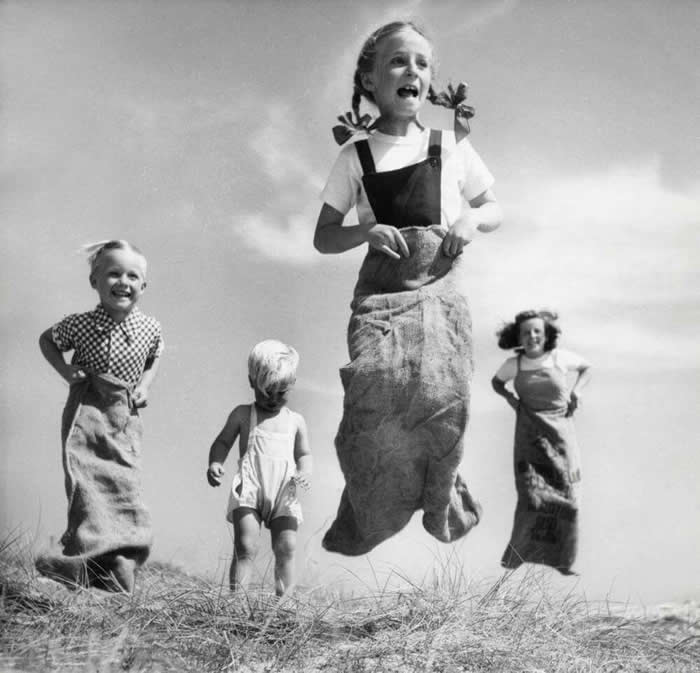 Kids playing and jumping together - Pure Joy of Childhood Black and White Photos