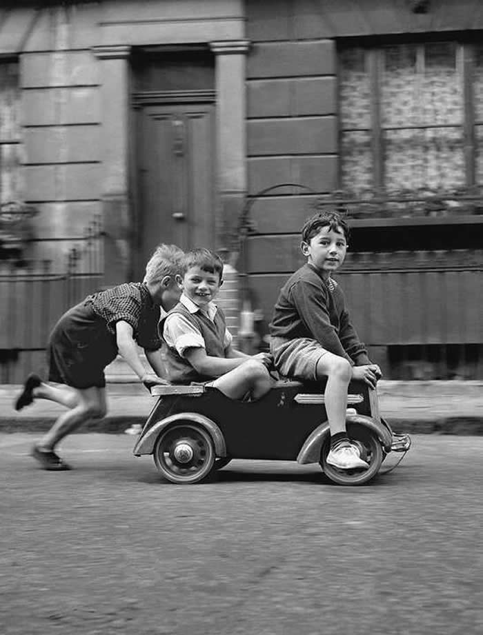 Boys playing with a toy car - Pure Joy of Childhood Black and White Photos