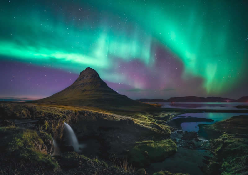 A mountain illuminated by the aurora by Yoshiki Fujiwara - 1839 Photographer of the Year Awards Landscape Winners