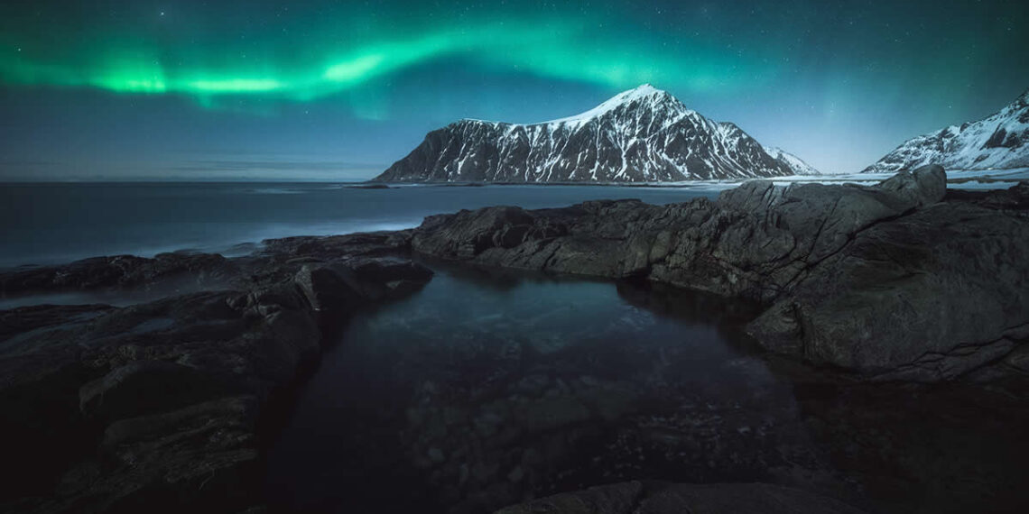 Northern Lights Dancing Over Lofoten by Christian Hoiberg