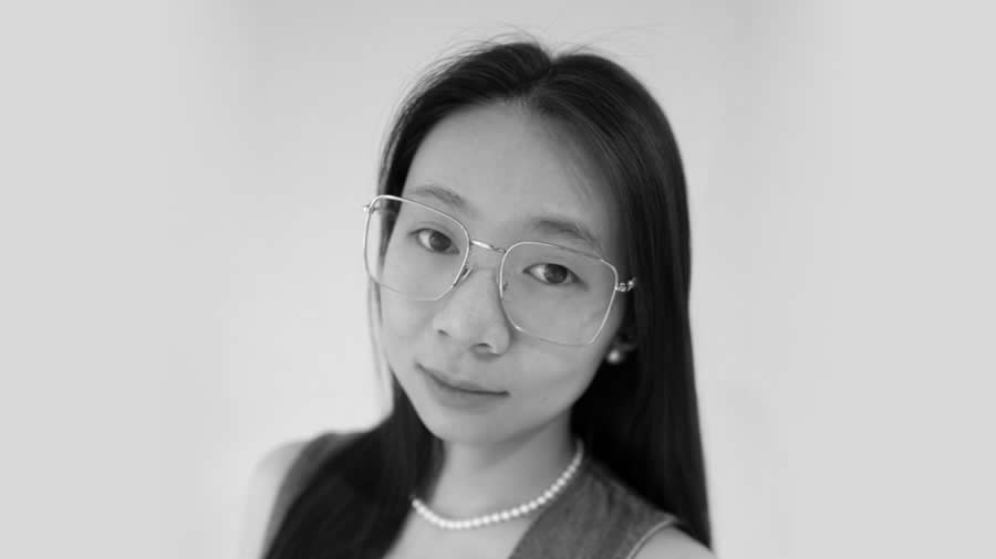 Minzhou Wang’s Quiet Bridge Between Human and Machine