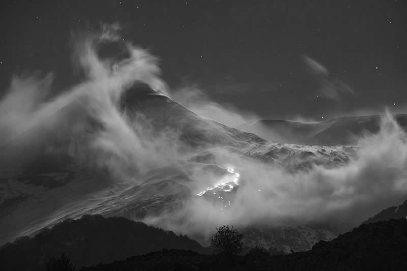 Moonlite dance over snowy volcano by Dario Lo Scavo, Italy - Award-Winning Landscape Photos