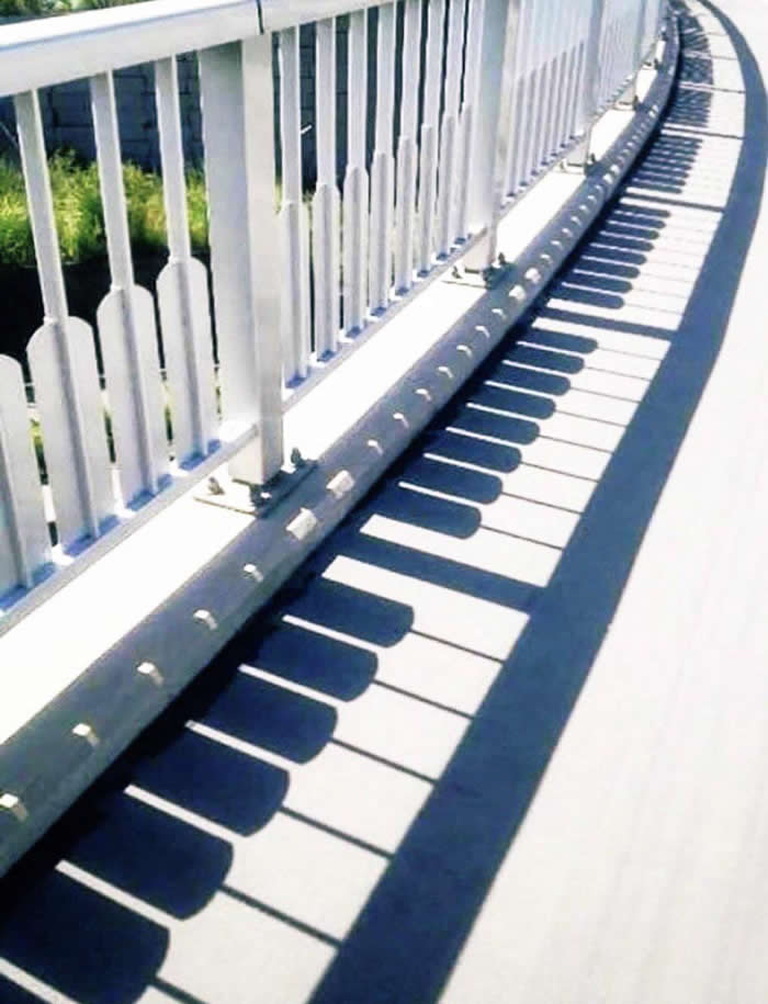 A fence with shadows that look like piano keys - Perfectly Aligned Photos