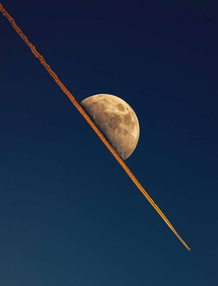 When a jet's contrail lined up perfectly with the moon - Perfectly Aligned Photos