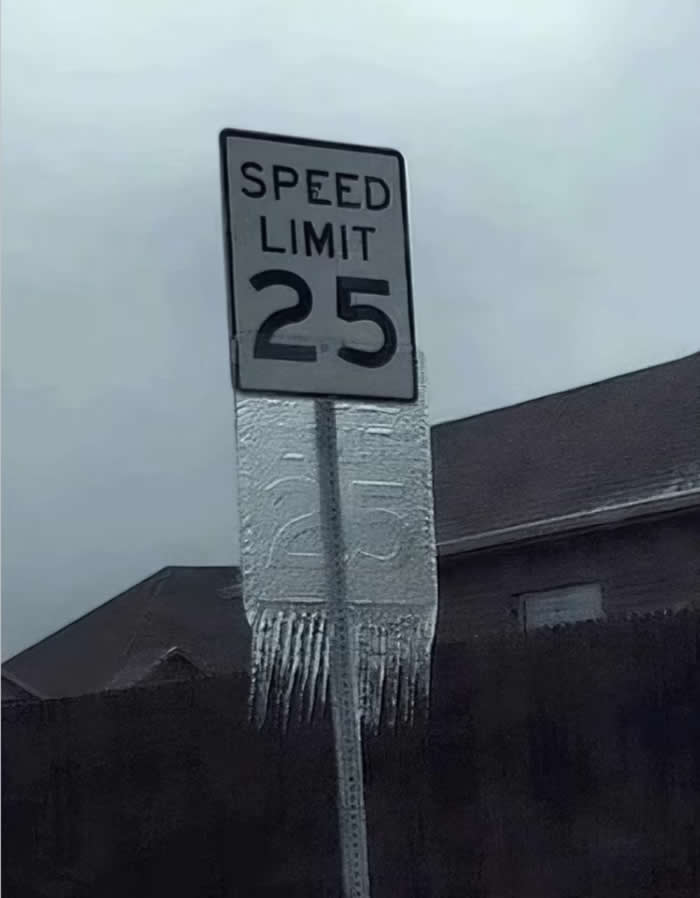 The ice sliding off of this sign... - Perfectly Aligned Photos