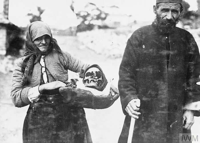 A Woman Moving To Another Village Takes With Her The Bones Of Her Dead Son - Rare and Weird History Photos