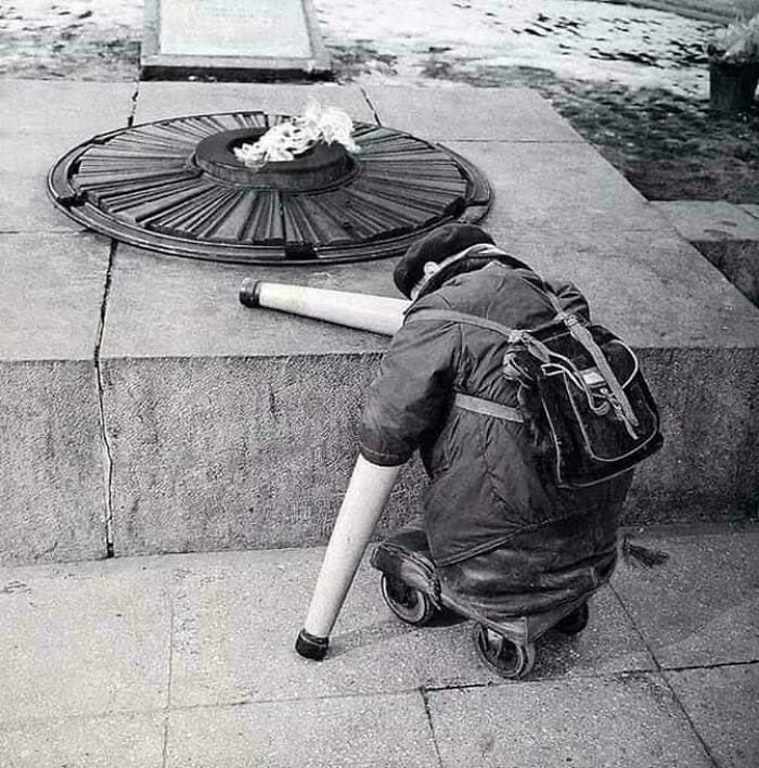 Soviet War Veteran Standing Near The Eternal Flame On The Anniversary Of Victory Day In 1966 - Rare Historical Photos Stories Behind the Past