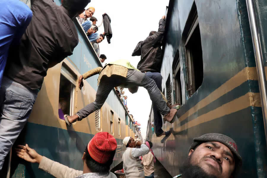 Alternative way of boarding train - Dhaka by Deba Prasad Roy - Independent Photographer Awards 2025 Street Winners