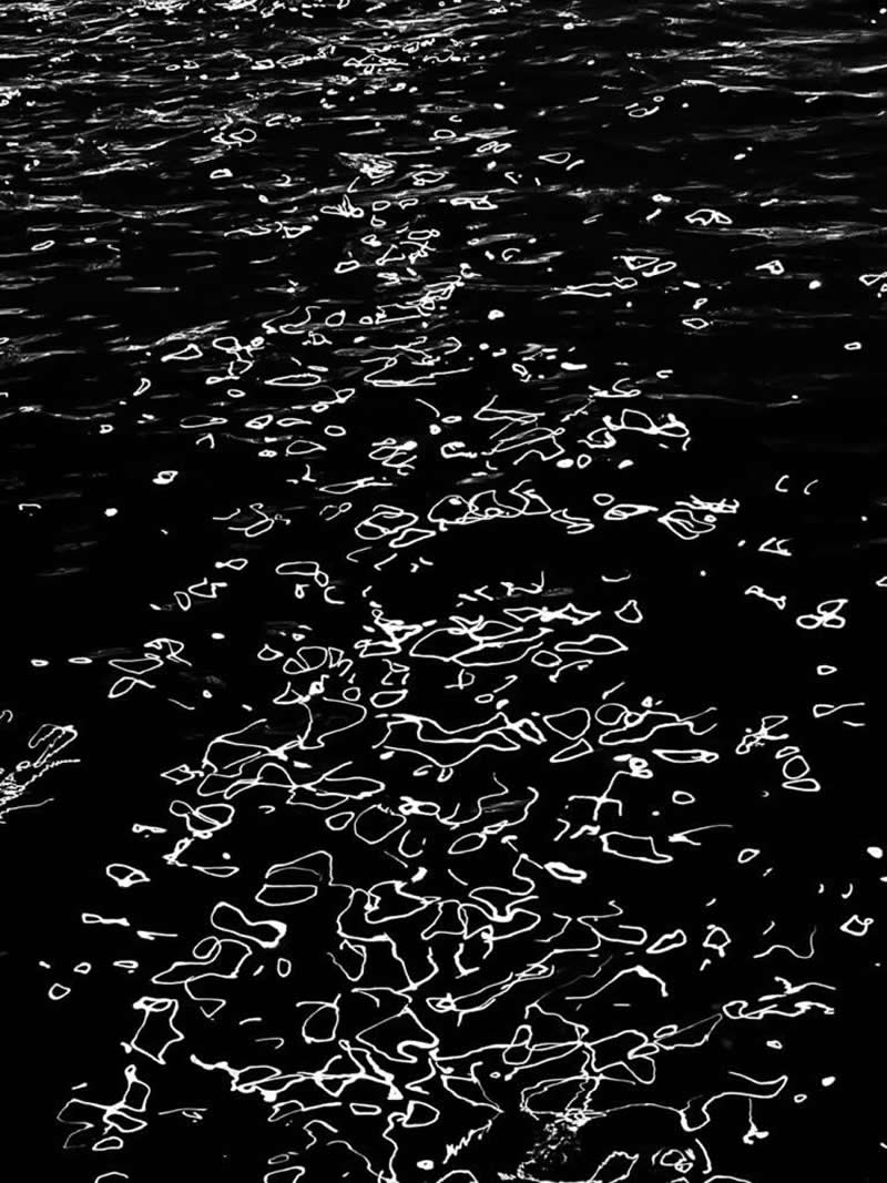 Dance of Light on Water by Kin Chan - Black and White Winners from the Mobile Photography Awards