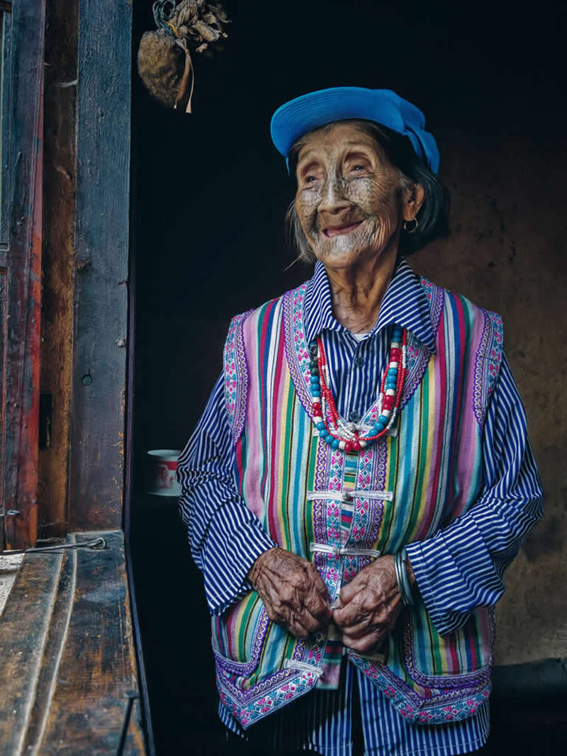 Old Lady with Facial Tattoos by Jenson Hu, Honorable Mention in Mobile Photography Awards in People Category