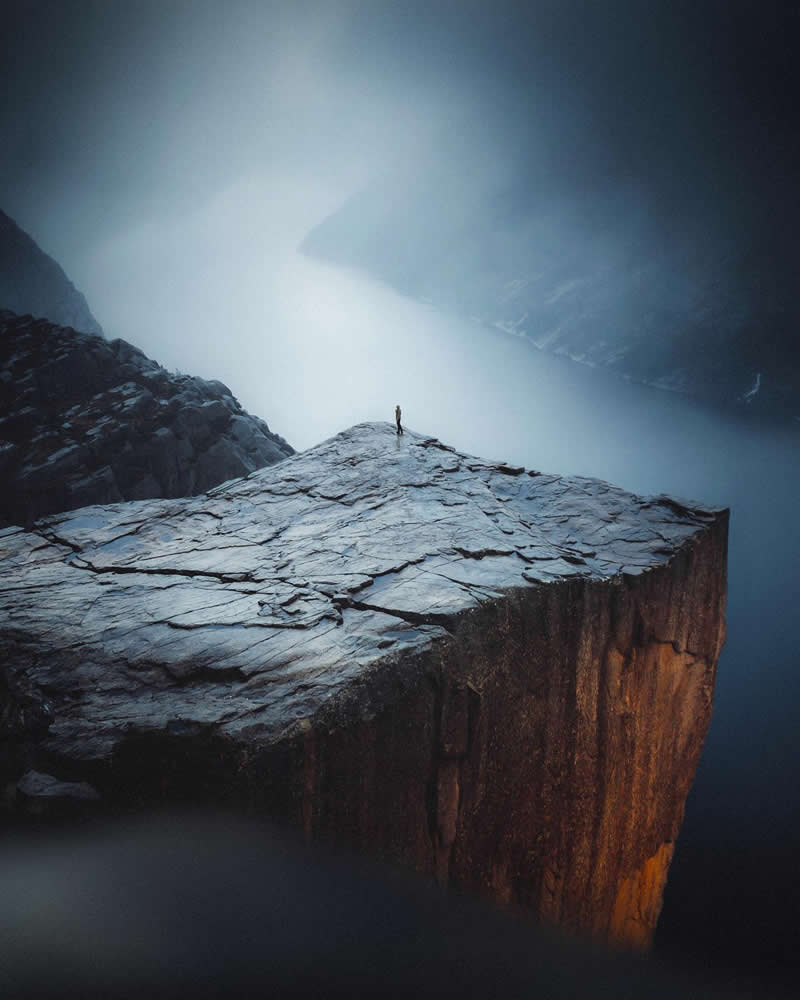 Up North Fiery Norwegian mood lighting up the face of Preikestolen - Outdoor Adventure Landscape Photography by Chris