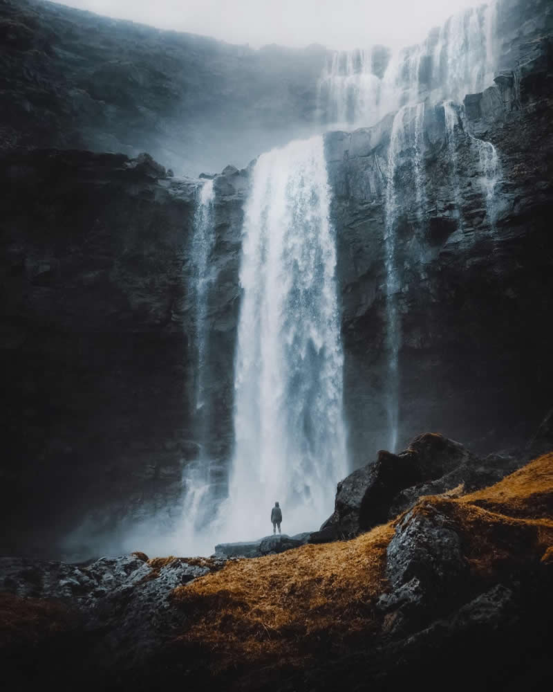 Dwarfed and drenched by the mighty Foss&aacute; - Outdoor Adventure Landscape Photography by Chris