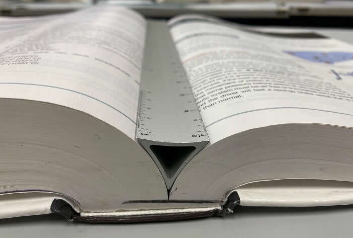 Ruler Fits Perfectly Into Book - Perfectly Timed Moments Where Random Things Fit Together