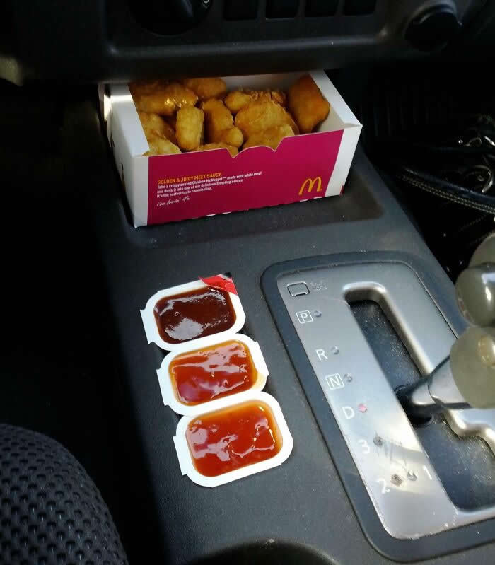 Nissan Xterra Compartment Fits Exactly 3 McDonald&rsquo;s Sauce Packets - Perfectly Timed Moments Where Random Things Fit Together