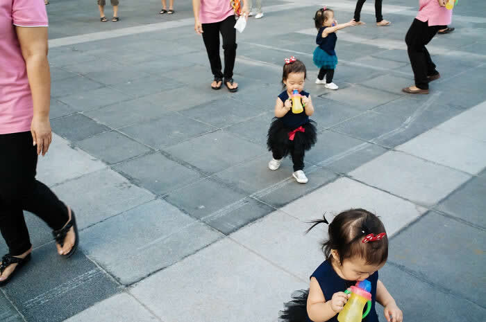 Perfectly Timed Street Photos by Tavepong Pratoomwong