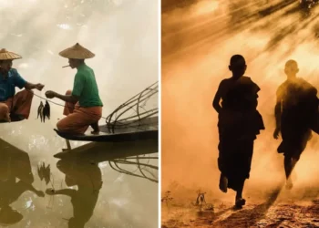 Fishermen on a boat and two monks walking in golden light