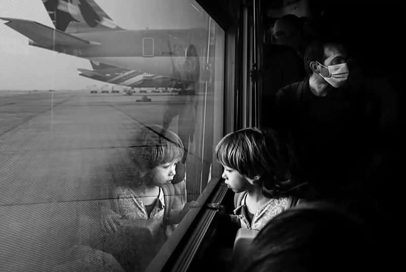 Reflective world - Black and White Street Photography Timing and Composition