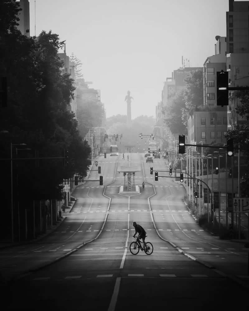 Ride - Black and White Street Photography Timing and Composition