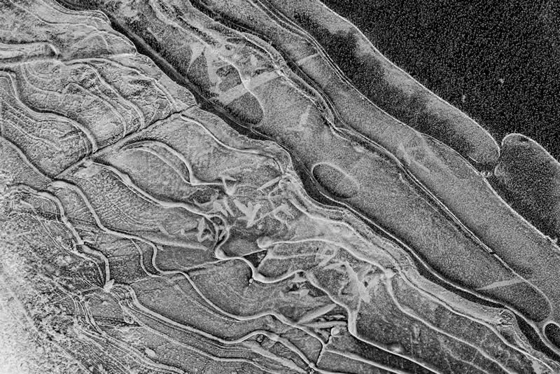 Pattern & Form - Gold: Lake Ice by Robert Nowak - Black and White Photography of Nature One Exposure Awards