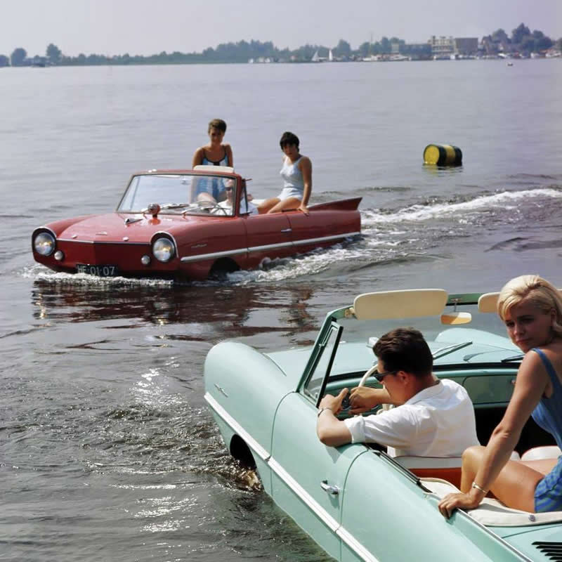 A pair of Amphicar Model 770s out on the water Loosdrecht Lakes, 1964 . - Rare Historical Photos In Color