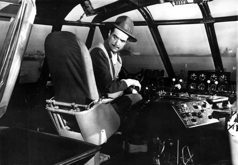 Howard Hughes, at the controls of his 200-ton flying boat (the Spruce Goose). c.1940. - Rare Historical Vintage Photos