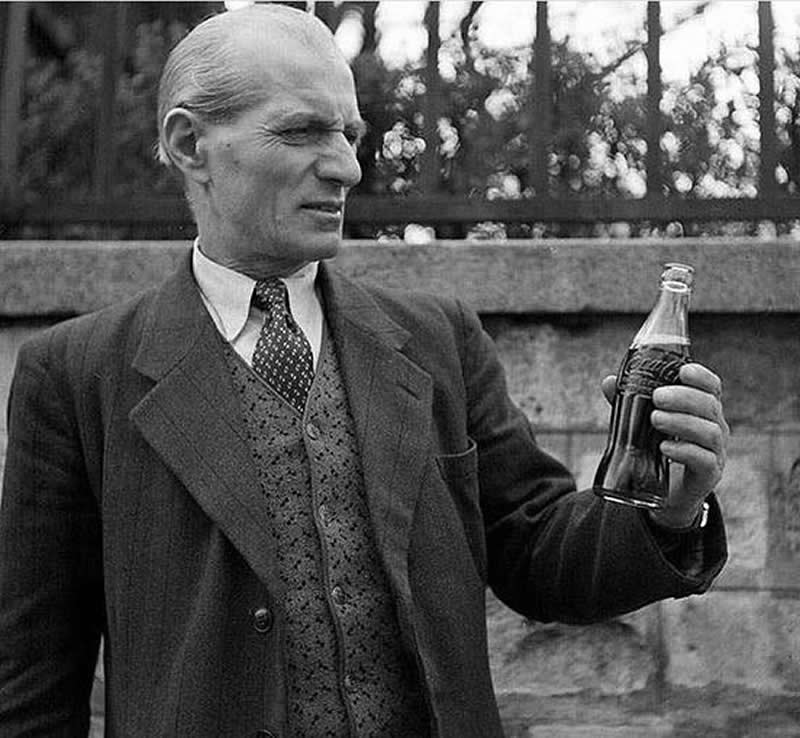 A French man reacts to trying Coca-Cola for the first time, 1950s - Rare Historical Vintage Photos