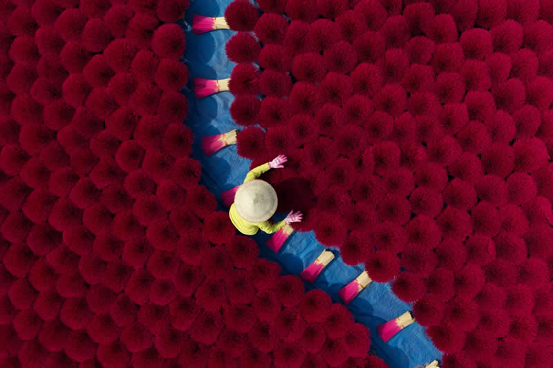 Incense sticks. These colorful sticks creates a unique scene to capture - Travel and Cuture Photography by Erdem Kilic